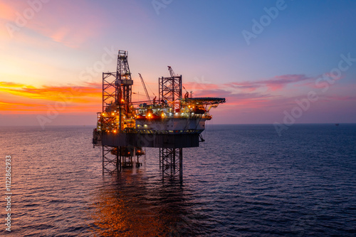 Wallpaper Mural Aerial view of silhouette offshore jack up drilling rig during sunset - oil and gas industry. Torontodigital.ca