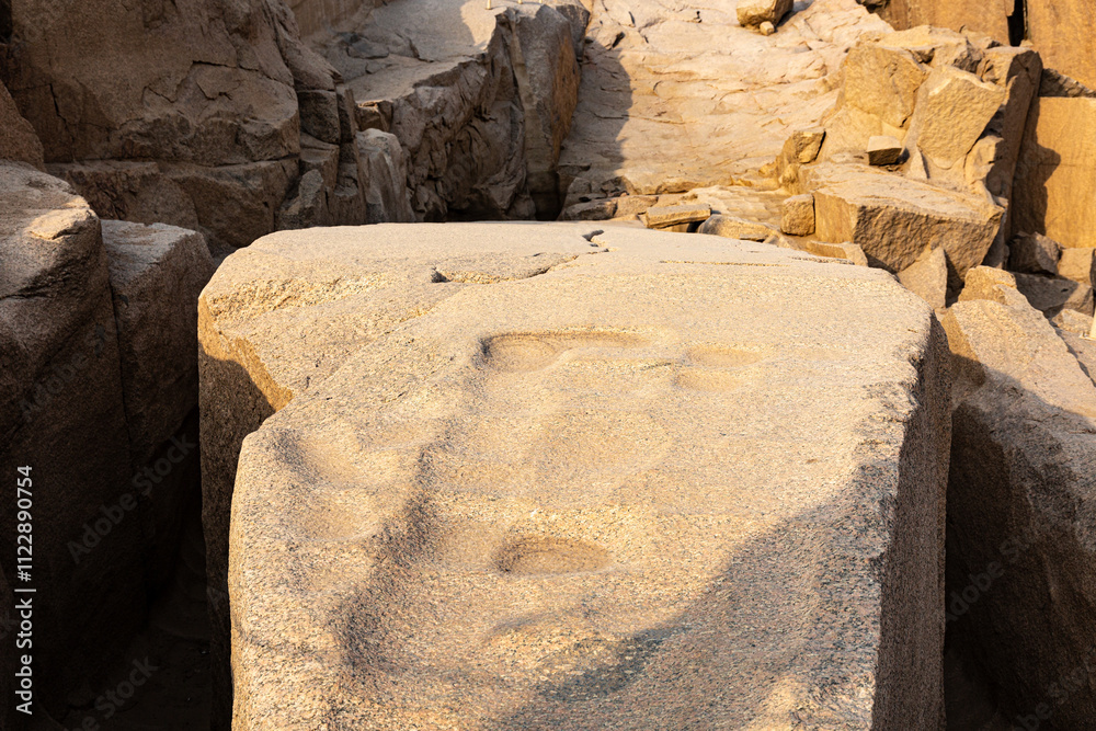 Ancient stone pit in the city of Aswan