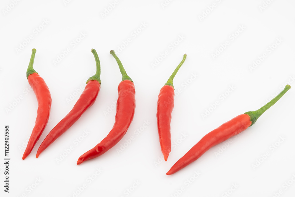 Fresh Red Chili Peppers Close-Up, Close-up of fresh red chili peppers on a white background, ideal for spice marketing, recipe blogs, and culinary or food-related designs. Fresh Red Chili Peppers Close-Up, Close-up of fresh red chili peppers on a white background, ideal for spice marketing, recipe blogs, and culinary or food-related designs.