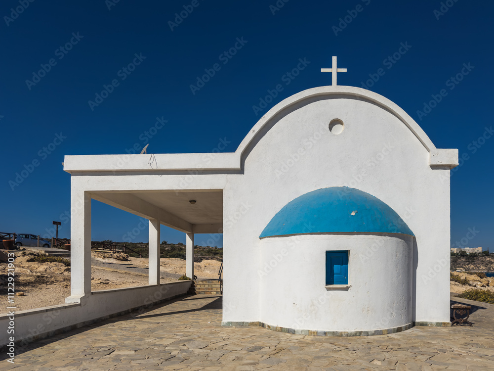 Title: Church of Saints Anargyroi in a Coastal Landscape