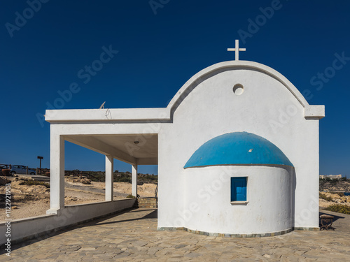 Obraz na płótnie Title: Church of Saints Anargyroi in a Coastal Landscape w salonie