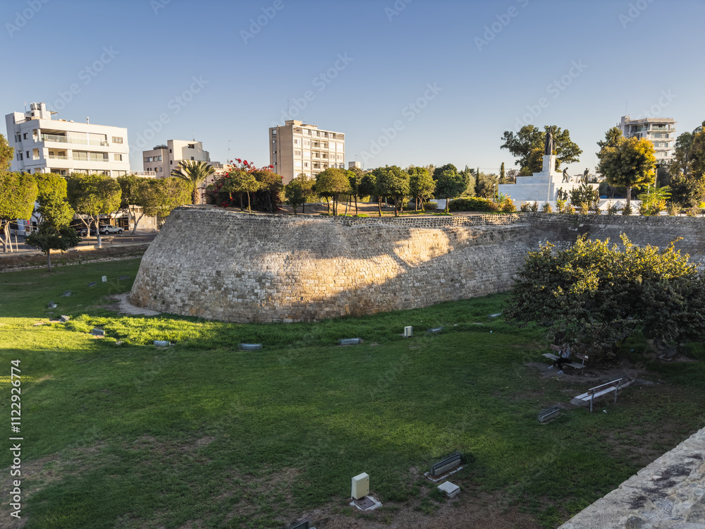 Ancient Stone Wall with Modern City Background