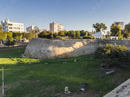 Ancient Stone Wall with Modern City Background