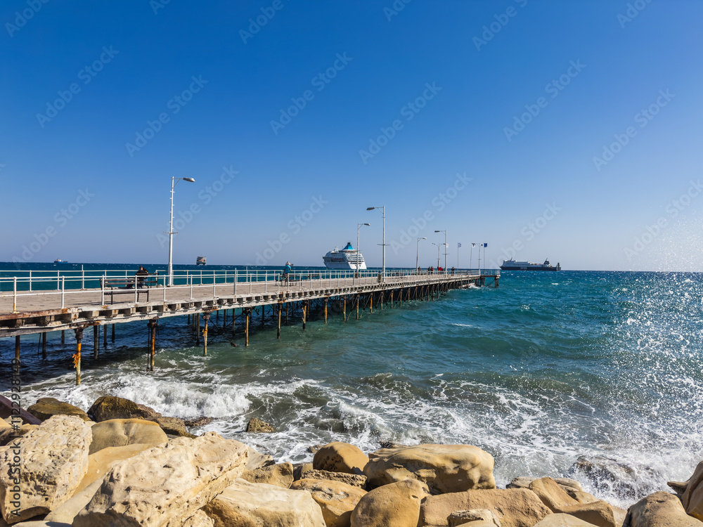 Seaside Pier with View of the Ocean and Ships
