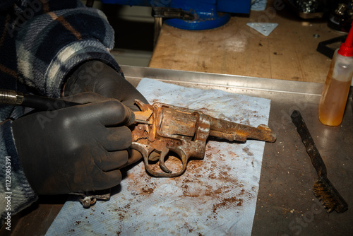 Handgun which became stone.