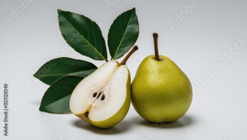 Pear and Leaf with a Cut Half Over White photo