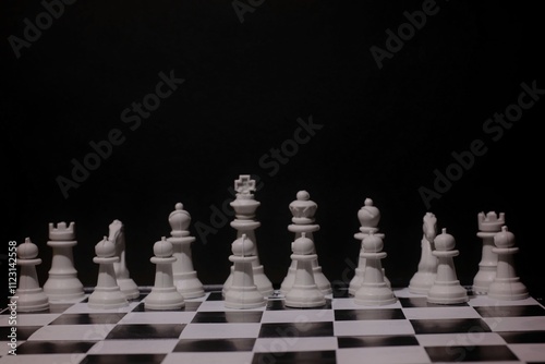 chess pieces arranged on a board. selective focus. game, strategy and business concepts