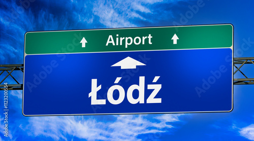 Road sign indicating direction to the city of Lodz, Poland