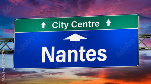 Road sign indicating direction to the city of Nantes, France