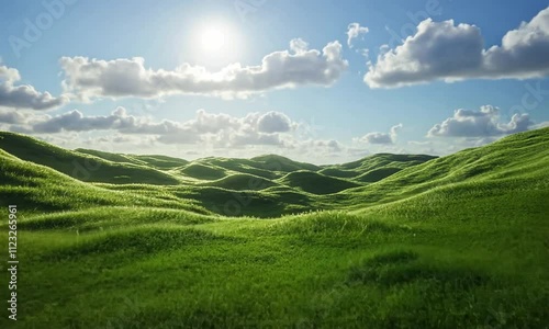 Sunlit Green Rolling Hills Under a Partly Cloudy Sky