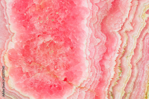 High-resolution image of rhodochrosite mineral specimen stone rock shows the intricate patterns and vibrant pink hues of a rhodochrosite stone, perfect for backgrounds or mineral studies