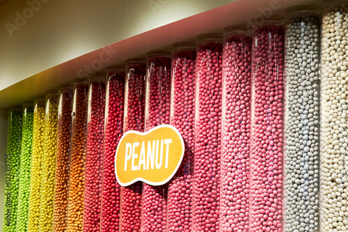 colorful peanut candies in large jars