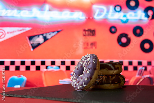 row of donuts in an American bar