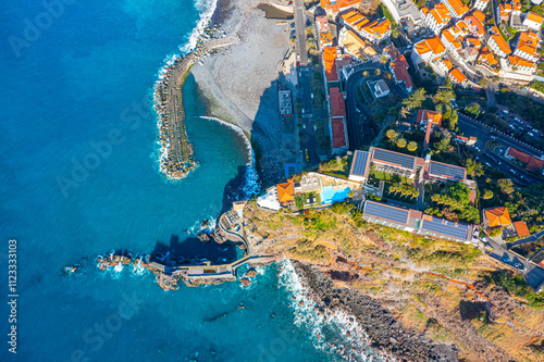 Obraz na płótnie Aerial view of Madeira island. Land meets ocean in Ponta do Sol, Madeira, Portugal w salonie