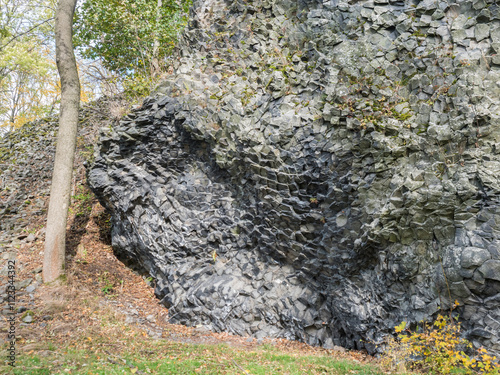 Basalt lava vulcanic rock formation, tile shape in Luzicke hory Lusatian Mountains, Czech Republic. photo