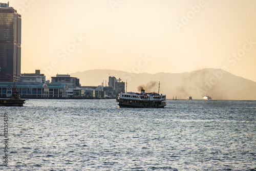 Hong Kong Star Ferry Navigating the Harbor at Sunset
