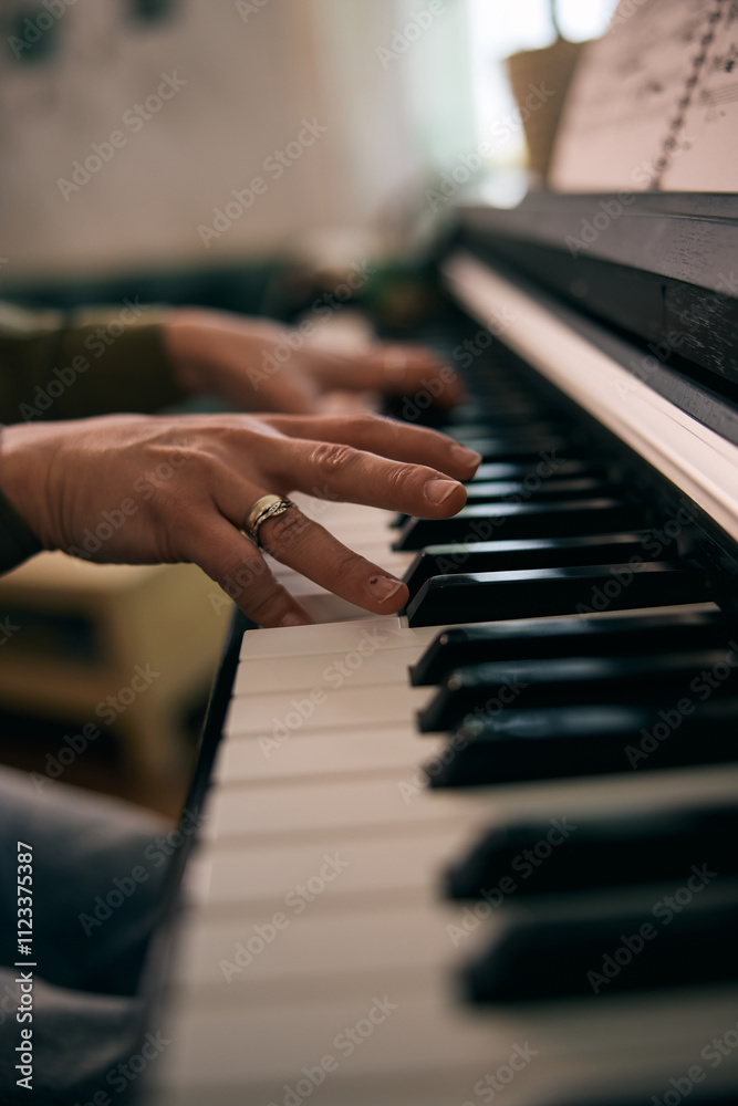Fototapeta premium Woman Playing Piano