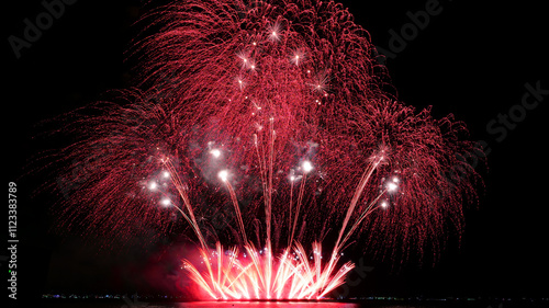 International fireworks display above the sea surface in Pattaya, Chonburi, Thailand.