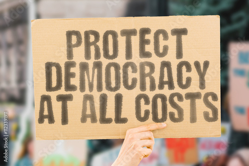 Banner reads 'Protect democracy at all costs' emphasizing the importance of freedom and governance. Freedom. Justice. Equality. Governance. Rights. Integrity. Unity.