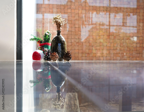 Reflection of the table decoration for Christmas.