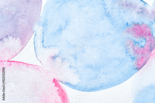 Abstract watercolor circles in pastel shades with blurred edge effect on white background.