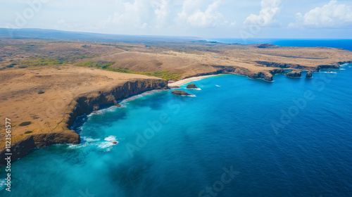 aerial view of a remote tropical beach with turquoise water, rugged cliffs, and vibrant waves, capturing the natural beauty of the coastline, perfect for adventure and coastal exploration