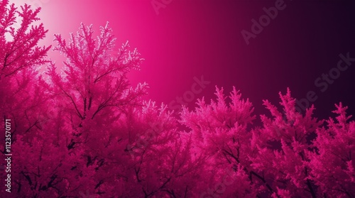 Colorful foliage with vibrant pink hues against a scenic backdrop during twil...