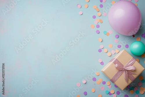 Blue pastel background with golden gift box, light blue ribbon, and heart-shaped confetti, ideal for romantic Valentine’s Day celebrations and elegant gift ideas. photo