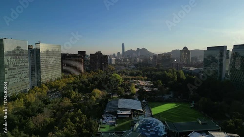 Panoramic Aerial View of a Modern Urban Park and City Skyline