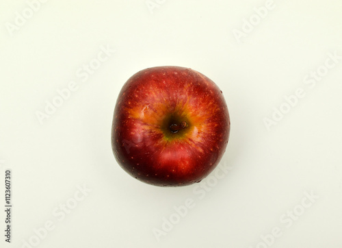 Red apples on a light background. Juicy fruits.