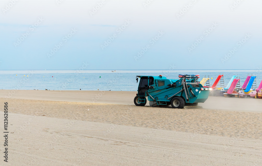 Obraz premium Beach Cleaning Machine on Sand. Copy space.