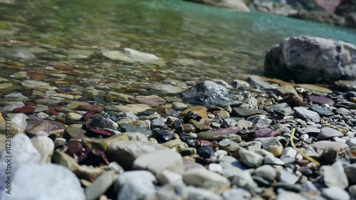 Water flowing on the Ganges river bank in Rishikesh