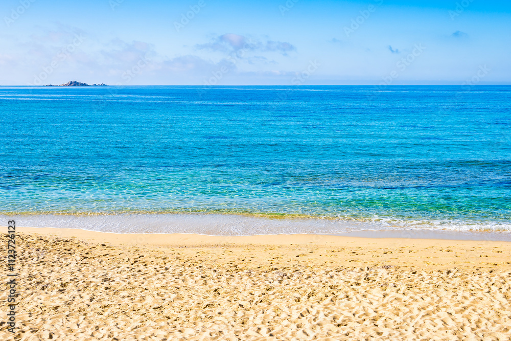 View of sandy Plaka beach and blue sea, Naxos island, Cyclades, Greece