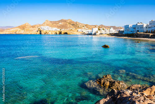 Obraz na płótnie Azure sea water on coast near Naxos town, Naxos island, Cyclades, Greece w salonie