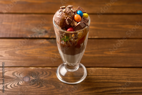 Chocolate Ice Cream Sundae with Kit Kat and Candies photo