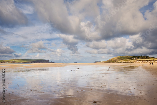 The Camel Estuary opposite Padstow at low tide with a dramatic sky. photo