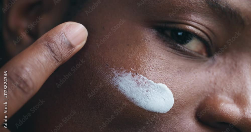 Face, skincare cream and black man apply moisturizer for hydration and beauty. Portrait, cosmetics product and closeup of lotion for dermatology, facial sunscreen and under eye treatment at home