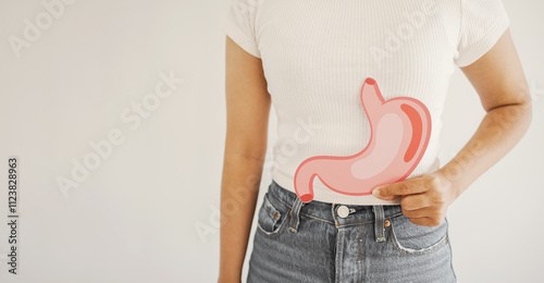 Fototapeta Naklejka Na Ścianę i Meble -  woman hands holding stomach, heartburn, Gastroesophageal reflux disease (GERD) or acid reflux symptom, health care concept
