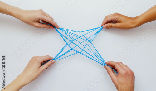 Teamwork Concept with Hands and Interwoven Blue Strings