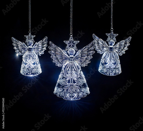 Elegant crystal angel ornaments with intricate snowflake motifs
