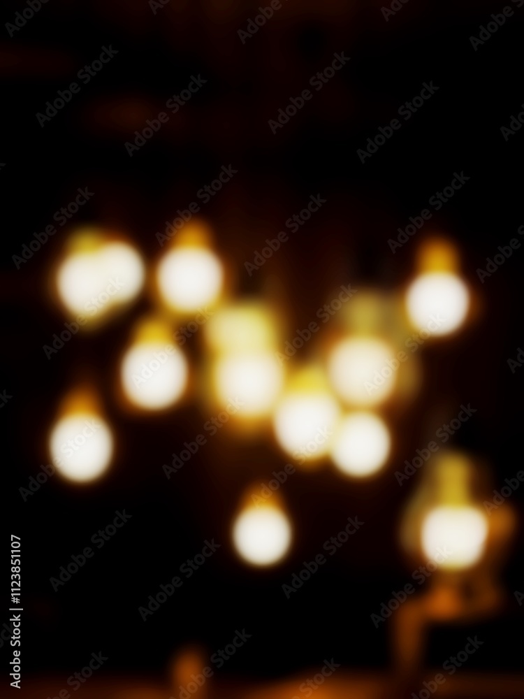 Obraz premium Bokeh Art with a Defocused Glowing Filament Bulb