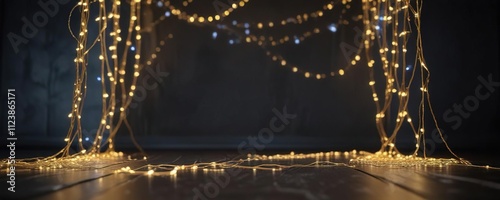 A sprinkling of blue and yellow string lights across a dark surface creates an enchanting ambiance, inviting contemplation, decorative lights, whimsical ambiance, minimalist decor photo