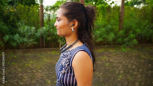 Woman On Slow Walk And Listening Music