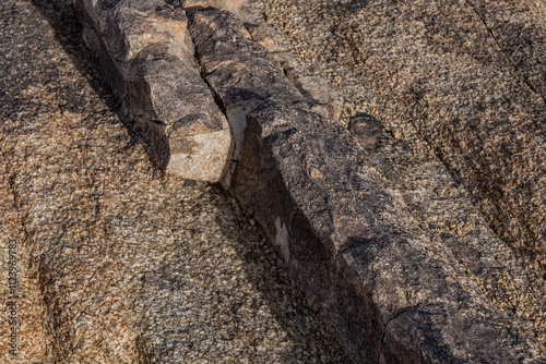 Dike or dyke.  Weathered Granitic Rocks. White Tank Quartz Monzonite. Skull Rock Nature Trail，Joshua Tree National Park, California. mojave desert photo