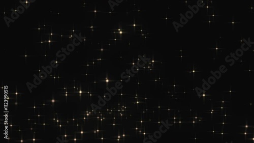 Motion graphics with glittering gold particles falling.