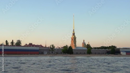 Experience a breathtaking view of St. Petersburgs historical architecture against a captivating sunset backdrop photo