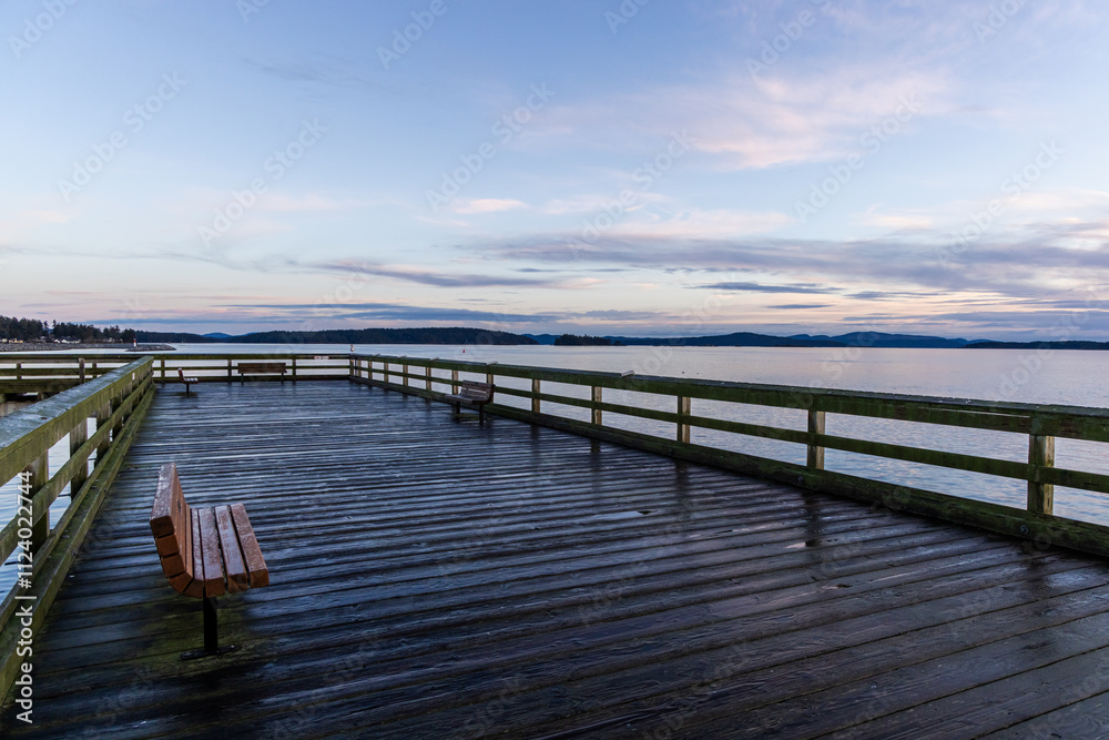 Fototapeta premium Serene Sunrise Over Sidney Pier on Vancouver Island Coastal View
