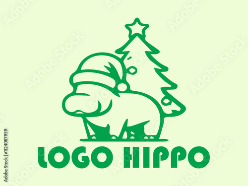 Green hippo with hat beside mini Christmas tree, perfect for holiday greeting cards, festive designs, childrens illustrations, and seasonal graphics photo