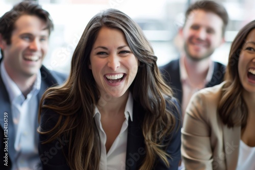 Portrait of a smiling businesswoman in front of her colleagues.