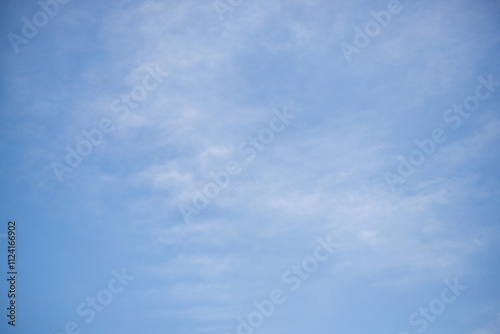 Sky background with clouds. White clouds against a blue sky.